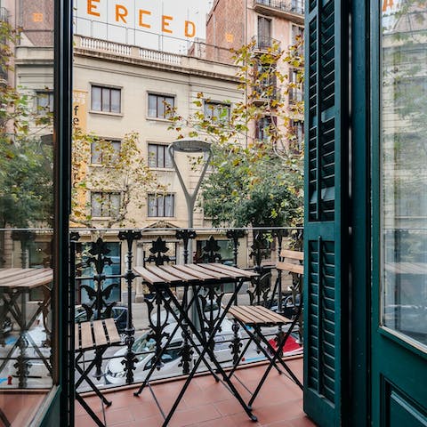 Sit out on the apartment's balcony during warm evenings