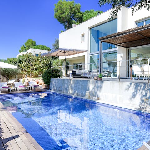 Take a cool dip in the classically tiled pool