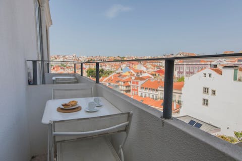 Unwind with an evening aperitif on the private balcony