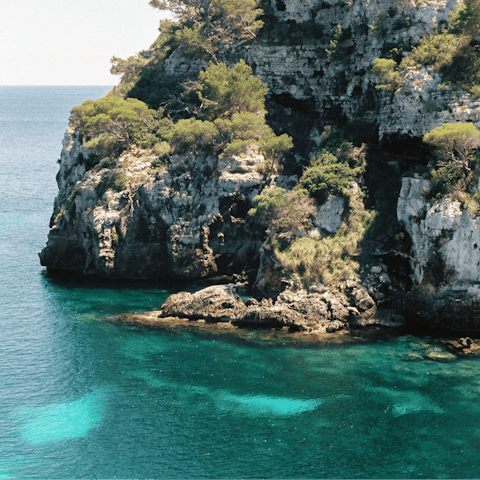 Stroll fifteen minutes into Binibeca and dip your toes in the sea