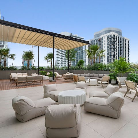 Enjoy a mojito on the building's rooftop lounge