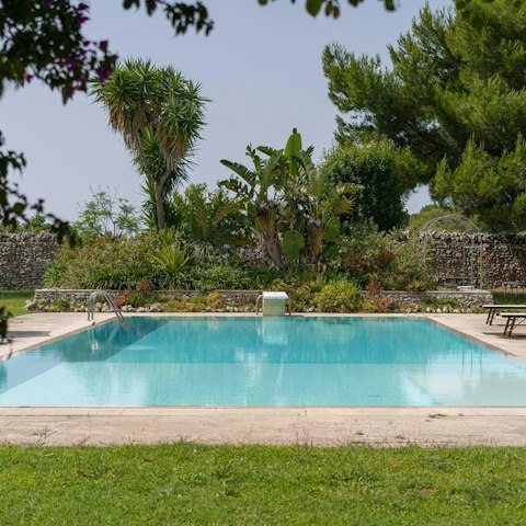 Find peace and relaxation while lounging by the pool