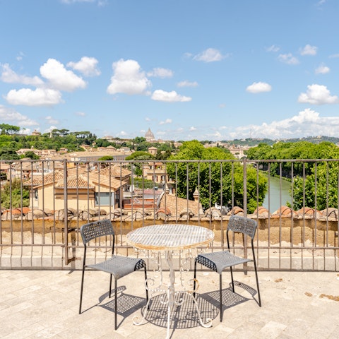 Enjoy the amazing 360-degree views of Rome from this home’s shared roof terrace