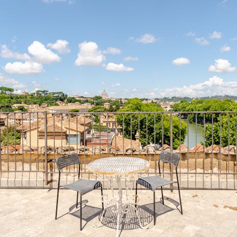 Enjoy the amazing 360-degree views of Rome from this home’s shared roof terrace