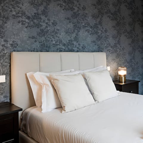 Enjoy a good night's sleep in the calming bedroom