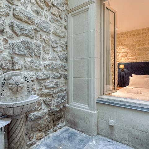 Step out to your serene, private courtyard from the lounge or bedroom