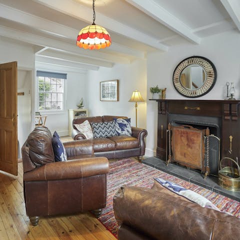 Spend cosy evenings in front of the log burning fireplace