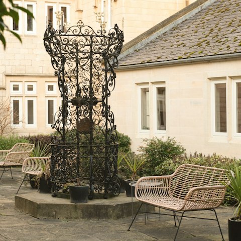 Relax in the serenity of the shared courtyard garden