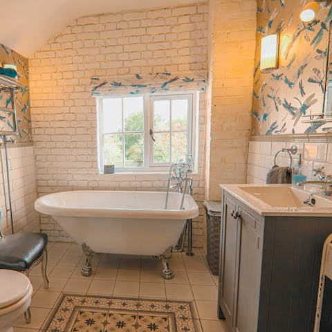 Have a long luxurious soak in the claw-foot bathtub