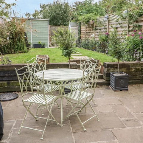 Relax in the private garden with a glass of wine