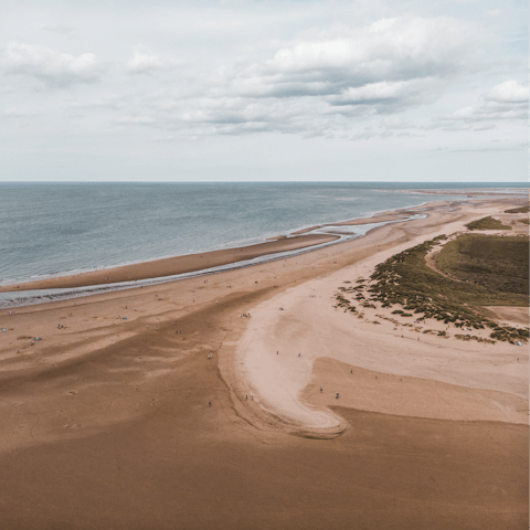 Load up the car and head to Brancaster Beach for a day on the sand, it's 5 miles away