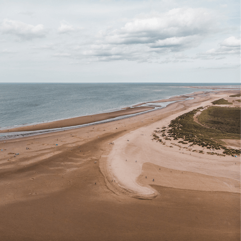 Load up the car and head to Brancaster Beach for a day on the sand, it's 5 miles away