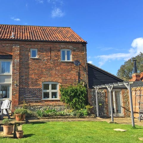 Enjoy a runaround the garden with the kids and furry friends in tow