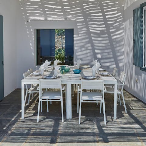 Wine and dine under the dappled sunlight of the pergola