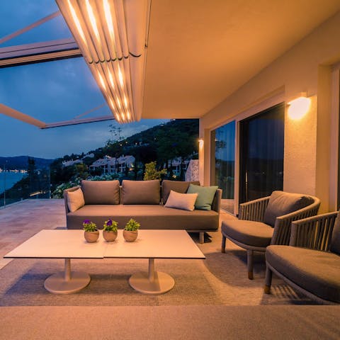 Mix up a cocktail at sundown and enjoy outside on the terrace
