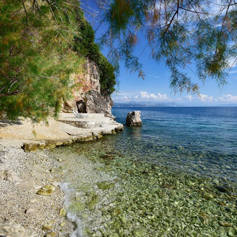 Start the day with a paddle in the shallows of your private beach