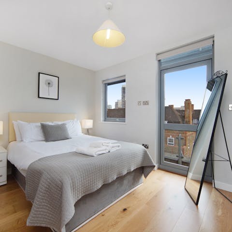 Wake up to the sight of East London rooftops from your window