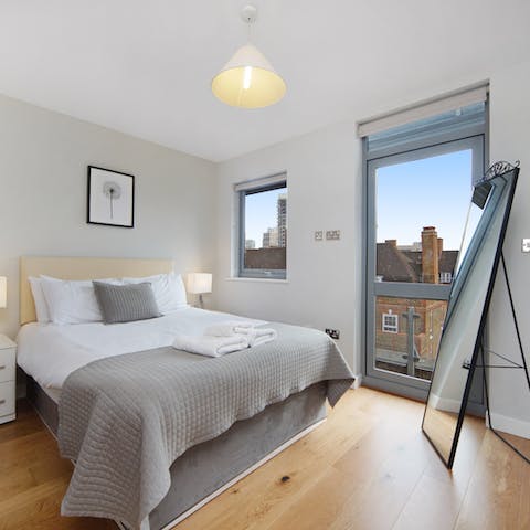 Wake up to the sight of East London rooftops from your window