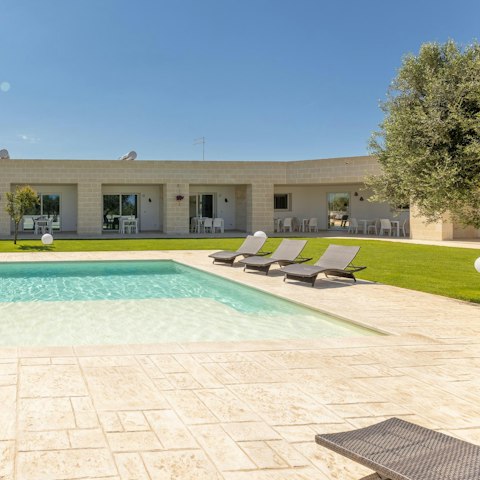 Take a dip in the shared swimming pool