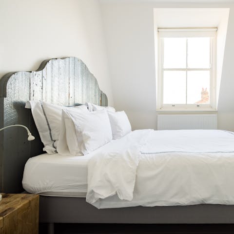 Wake up to the sun shining through the big windows in the comfortable bedrooms