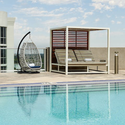 Spend mornings relaxing on a sun bed, or reading in the swinging egg chair