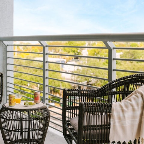 Enjoy a coffee and a snack on the private balcony