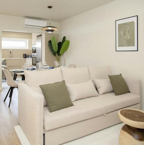 Make yourself at home and snuggle up for an evening of movies on the comfy sofa