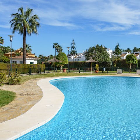 Enjoy a refreshing dip in the communal swimming pool