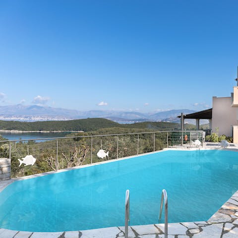 Take a refreshing dip in the sparkling swimming pool