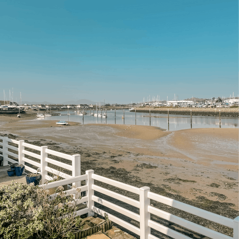 Spend the day on Pwllheli Traeth Marian-y-de Beach, 2.5 miles away