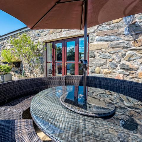 Enjoy a spot of cream tea on your patio in the sunshine