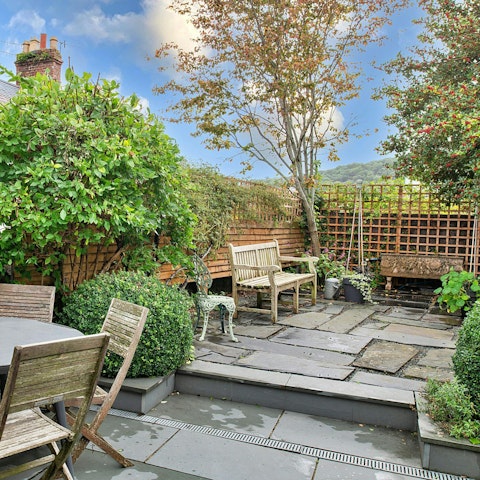 Enjoy the sun in your own private paved garden
