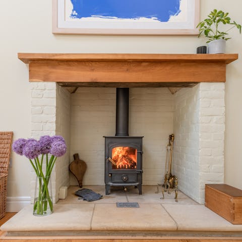 Warm up in front of the log burner on a chilly evening