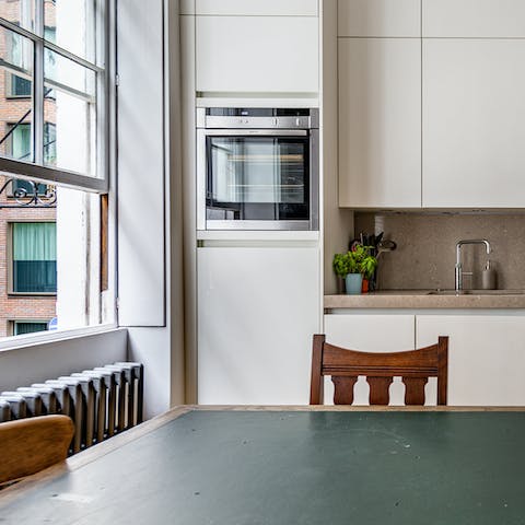 Prepare a light lunch in your sleek, light-filled kitchen