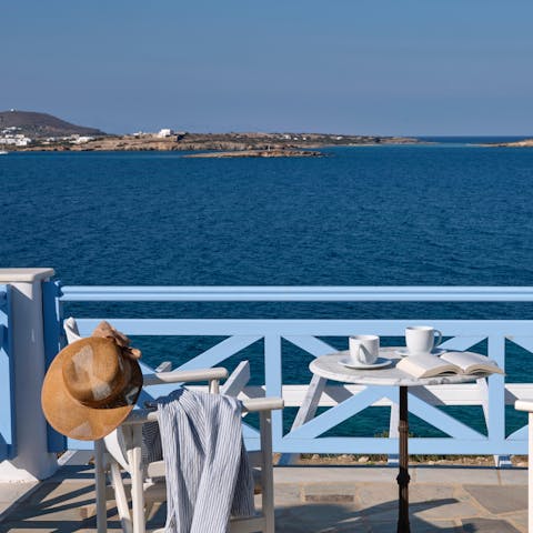 Begin the day with a fresh Greek coffee on the balcony, overlooking the ocean