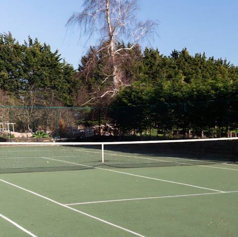 Head to the private tennis court for some friendly-competition