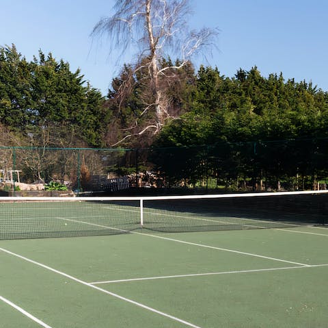 Head to the private tennis court for some friendly-competition