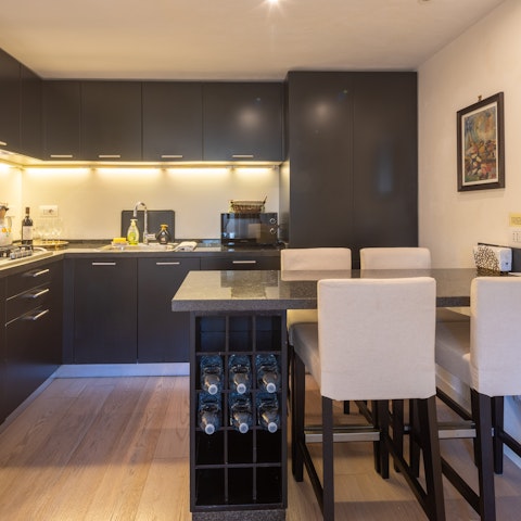 Rustle up your favourite pasta dish in the sleek kitchen