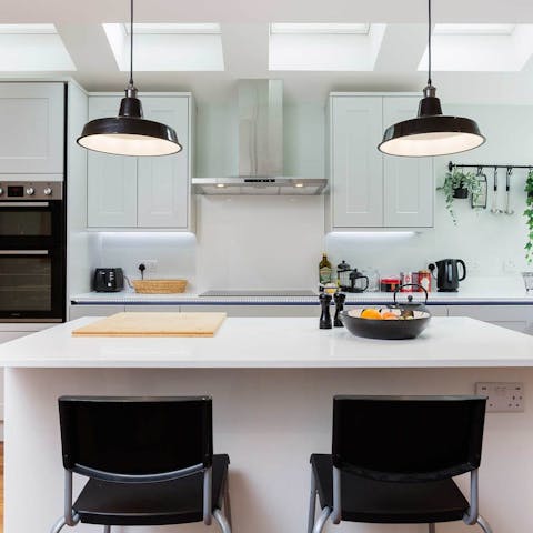 Catch up over drinks and nibbles at the breakfast bar
