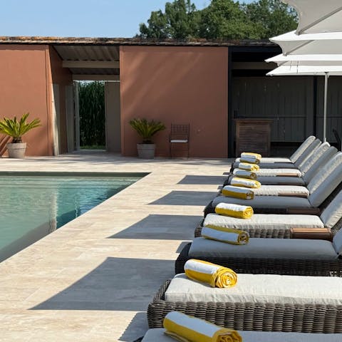 Spend relaxed days lounging by the private heated pool