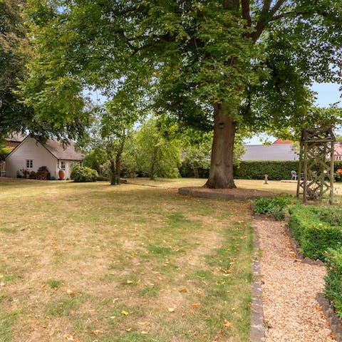 Wander about your extensive private garden four-legged friend in tow
