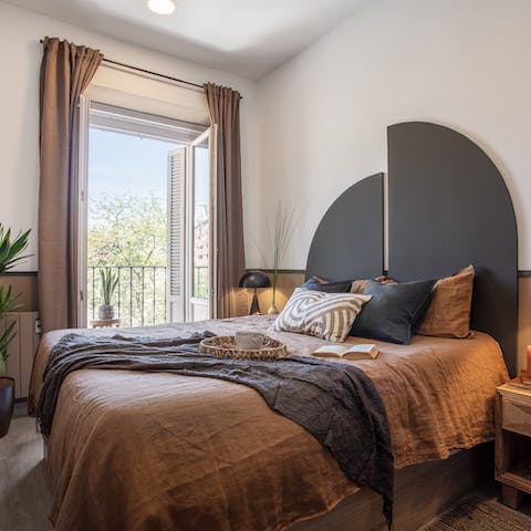 Wake up to serene green views from your private balcony