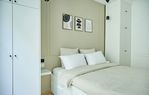 Relax in the serene bedroom after a day of Paris sightseeing