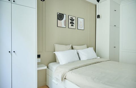 Relax in the serene bedroom after a day of Paris sightseeing