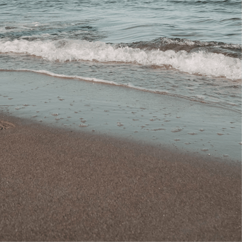 Spend the day on Mikri Ammos Beach, a two-minute drive away