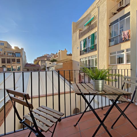 Sit out on the balcony and sip some local cava after a busy day