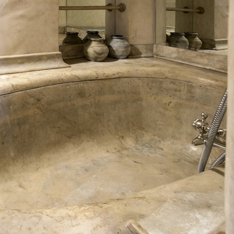 Soak in the sunken bathtub, like a true Roman