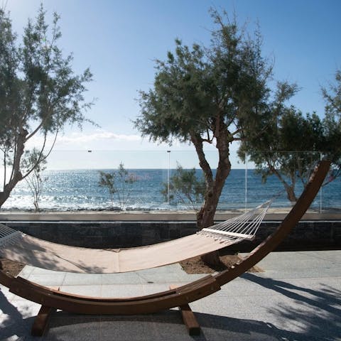 Unwind in the hammock, after a spot of wild swimming in the sea