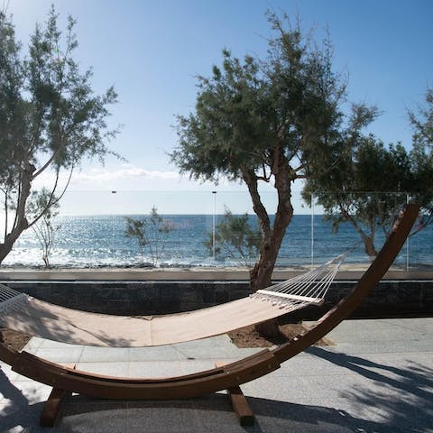 Unwind in the hammock, after a spot of wild swimming in the sea