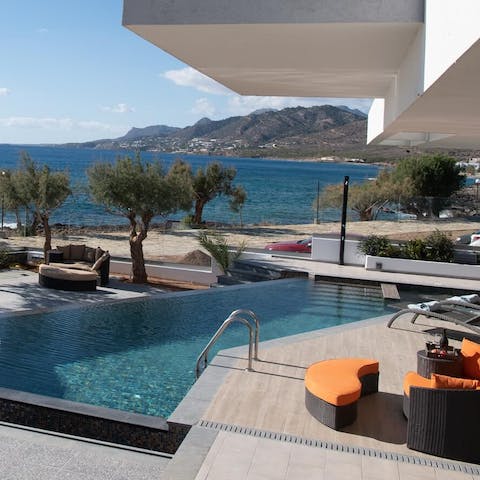 Take a dip in the sparkling swimming pool with views across the seascape